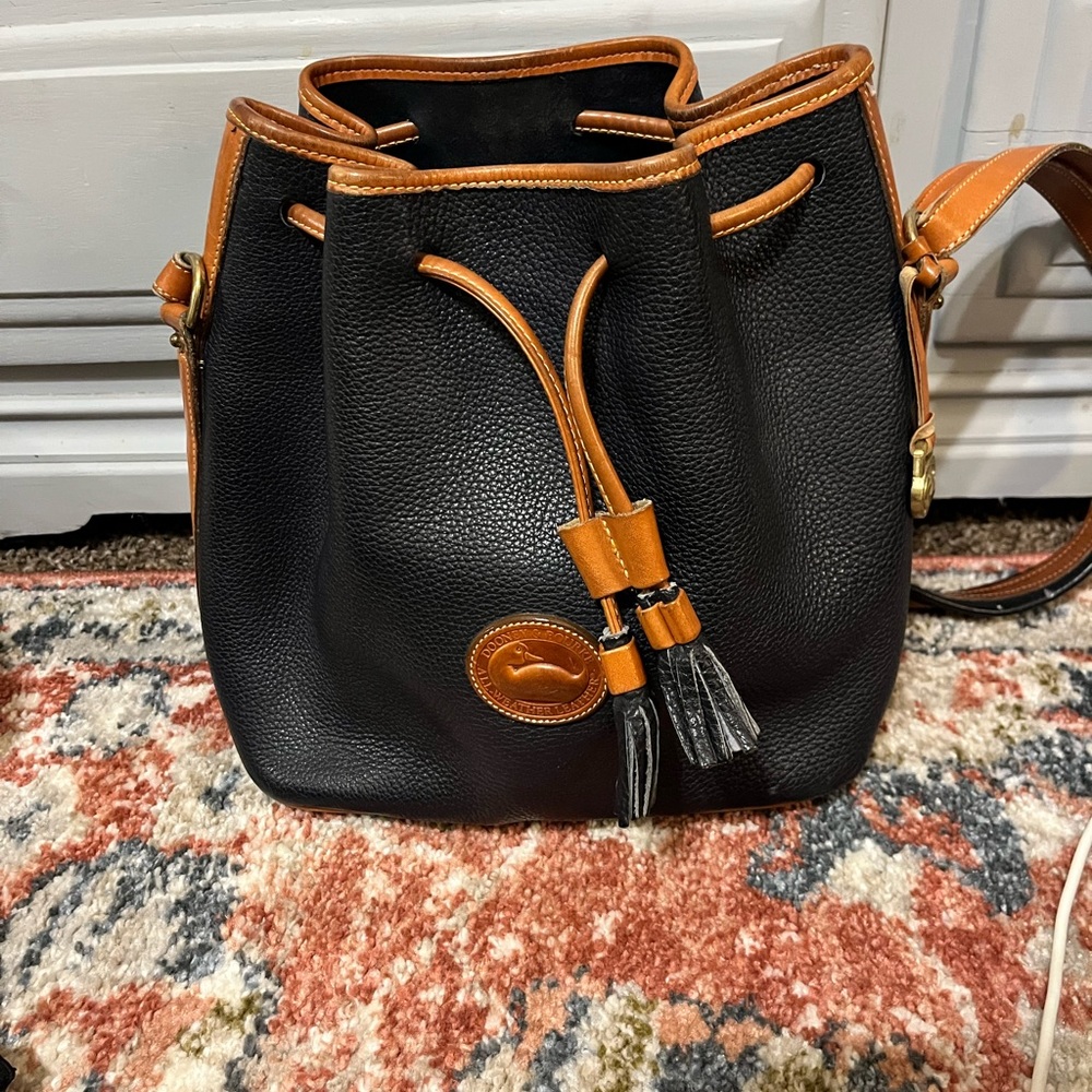 Vintage Dooney & Burke Bucket bag. Any scuffs or imperfections are pictured.